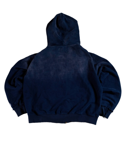 worn navy zip up